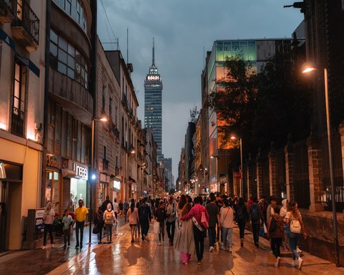 Busy street view in Mexico City showing daily urban commute